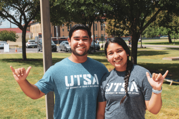 students in front of UTSA housing